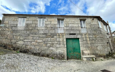 Casa de piedra con terreno